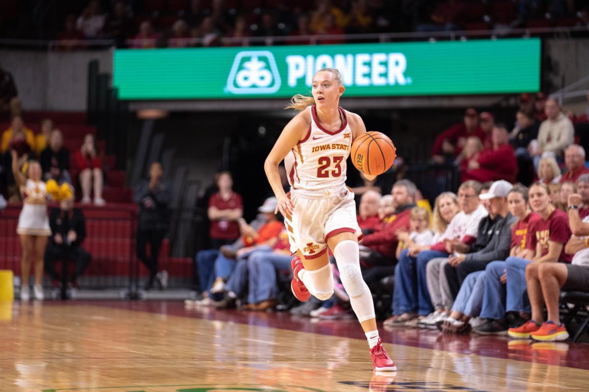 Kelsey Jones (23) looking for passing options during the Iowa State vs Central College match, Hilton Coliseum, Oct. 30, 2024.