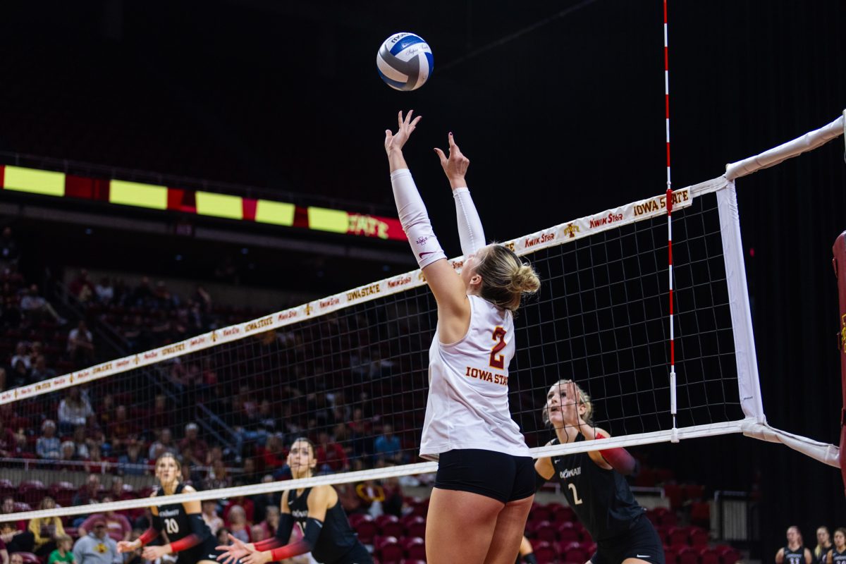 Morgan Brandt (2) sets the ball during the Iowa State vs Cincinnati volleyball game at Hilton Coliseum on Oct. 2, 2024.