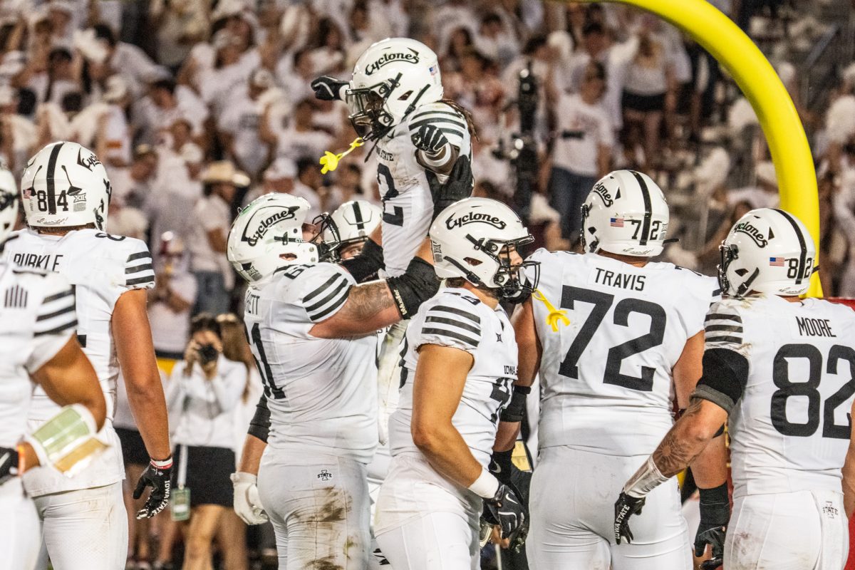 Jaylon Jackson (12) celebrates after a touchdown with his teammates during the Iowa State vs. Baylor football game at Jack Trice Stadium on Oct. 5, 2024.