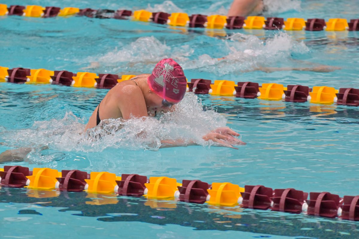 Iowa State swimmer Abbi Crum is in lane three competing against the visiting South Dakota swimmers in lane three, getting first in the 200m breaststroke, Oct. 18, 2024.