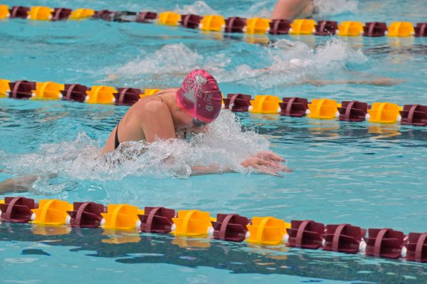 Iowa State swimmer Abbi Crum is in lane three competing against the visiting South Dakota swimmers in lane three, getting first in the 200m breaststroke, Oct. 18, 2024.