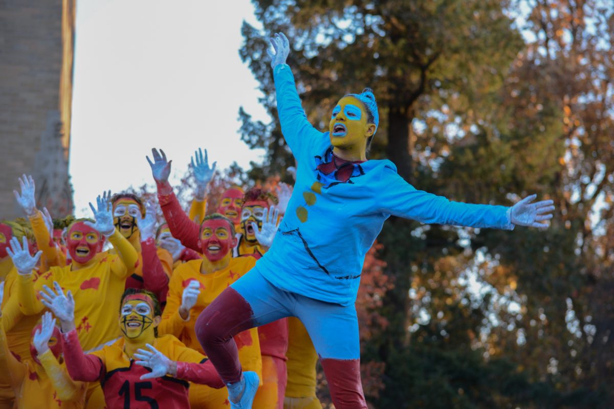 Members of the Yell Like Hell group "United Cy-Lines" perform onstage during the Yell Like Hell second cuts, Iowa State University, Ames, Iowa, Oct. 31, 2024.