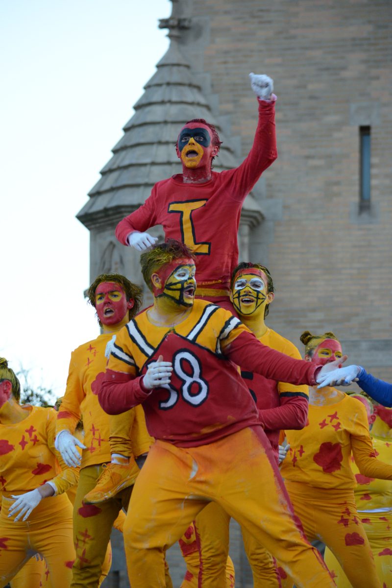 Members of the Yell Like Hell group "United Cy-Lines" perform onstage during the Yell Like Hell second cuts, Iowa State University, Ames, Iowa, Oct. 31, 2024.