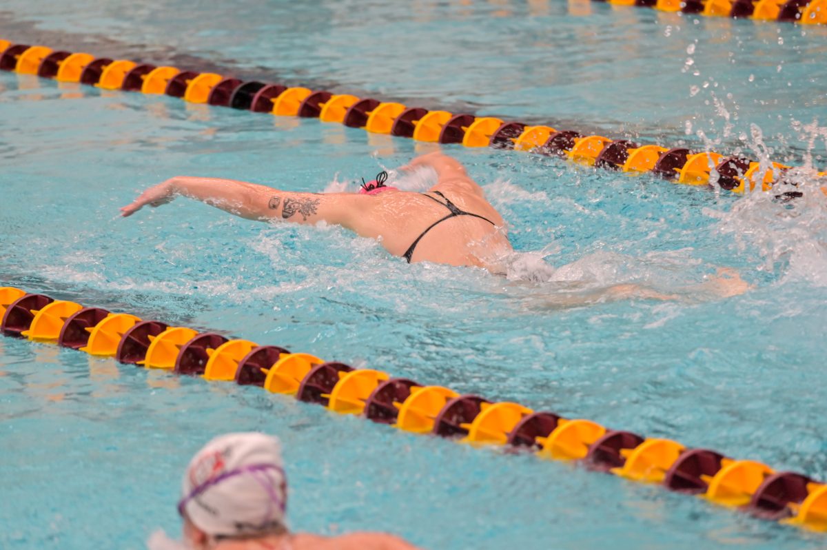 Iowa State Winter Craig in lane three competes against the visiting South Dakota swimmers in the 200m butterfly getting first place, Oct. 18, 2024.