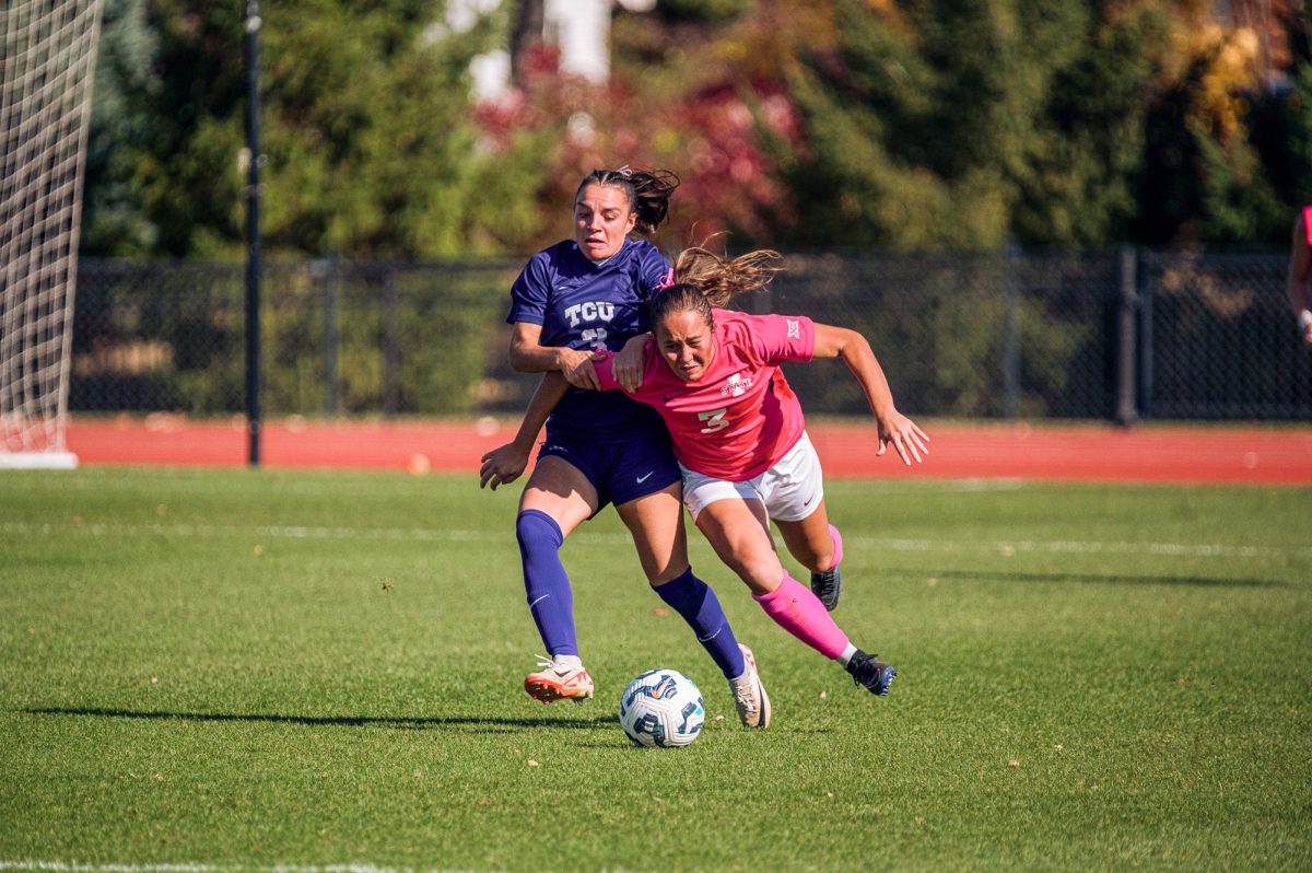 Iowa State player Isabella Agrusso (3) gets grabbed by a Texas Christan University player while she was controling the ball during a home game at Iowa State Cyclone Sports Complex, Oct. 20, 2024.