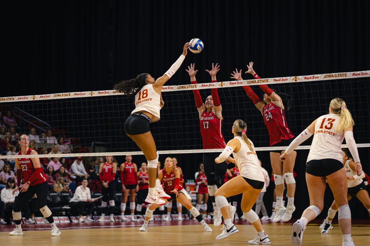 Amiree Hendricks-Walker (18) hits the ball during the Iowa State University vs. Texas Tech University volleyball game at Hilton Coliseum on Oct. 18, 2024.