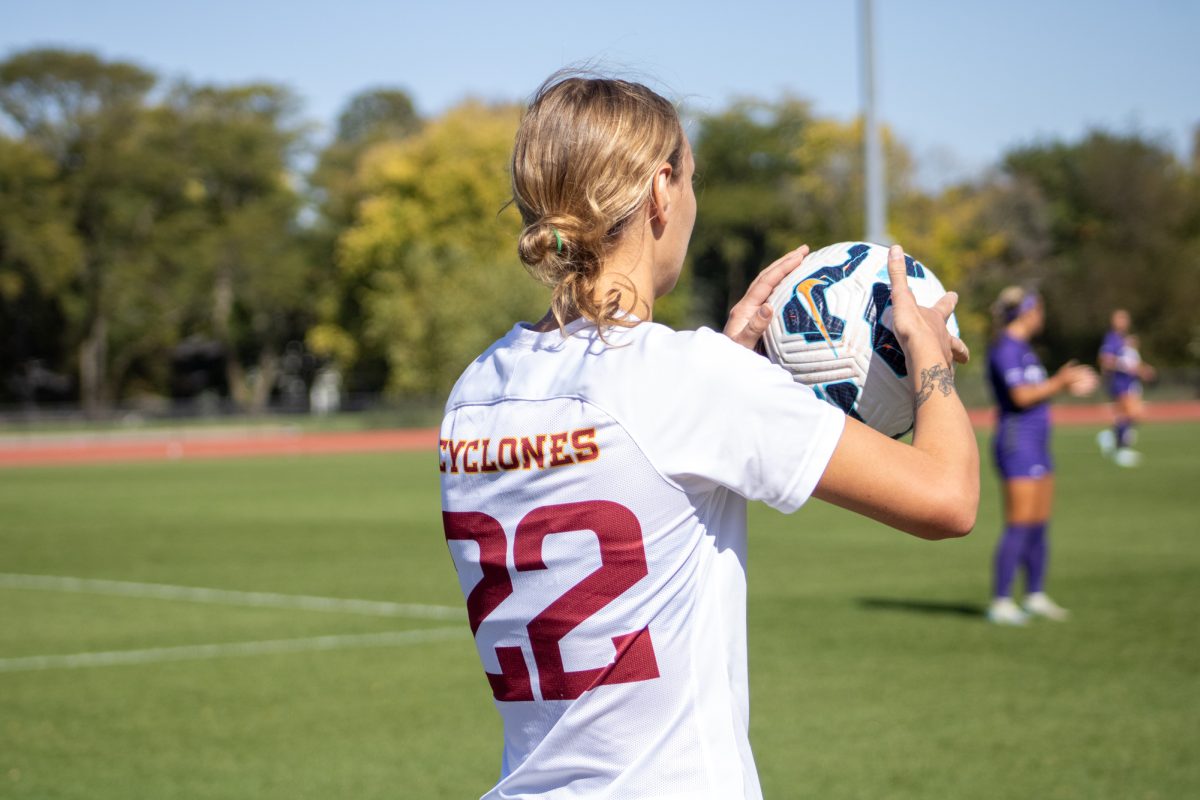 Iowa State's women's soccer player Adelaide Wolfe (22) ready to throw in the ball to resume play versus K-State at Cyclone Sports Complex, Oct. 6, 2024. 