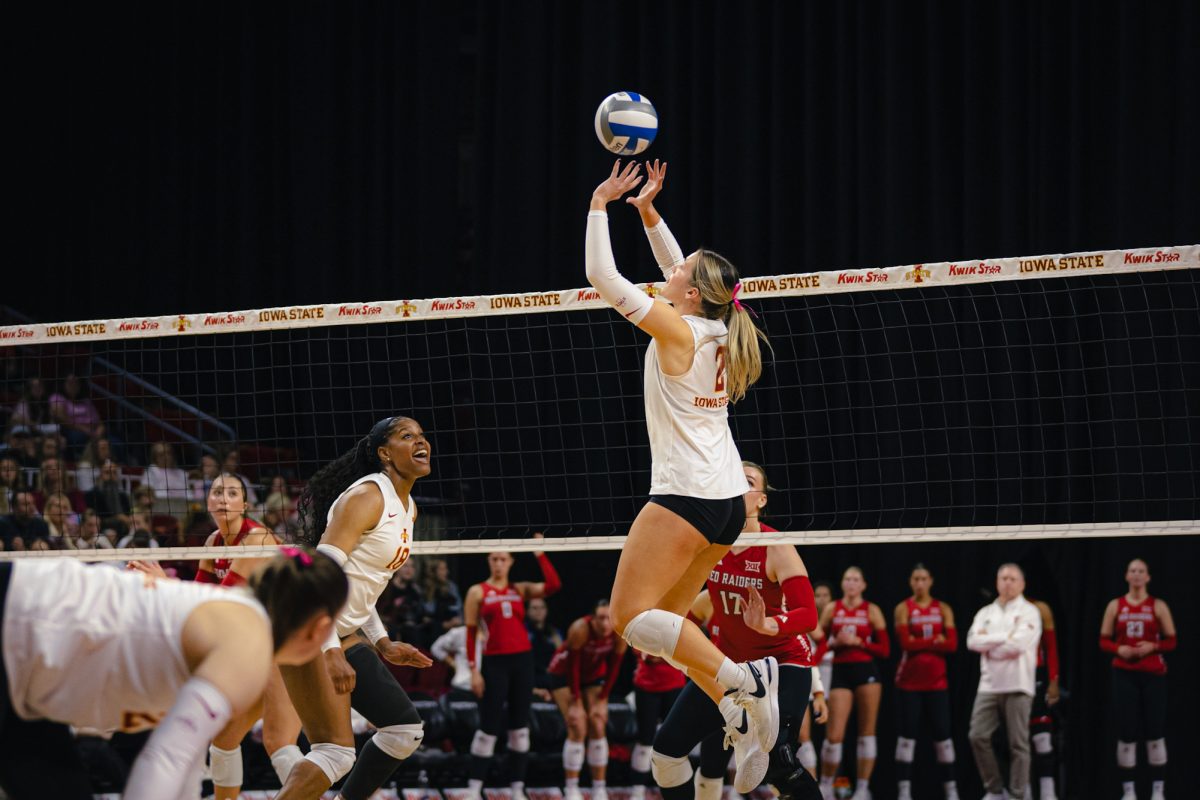 Morgan Brandt (2) sets the ball during the Iowa State University vs. Texas Tech University volleyball game at Hilton Coliseum on Oct. 18, 2024.