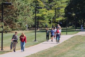 Iowa State Students walking near Curtiss Hall. Oct. 7th, 2024.