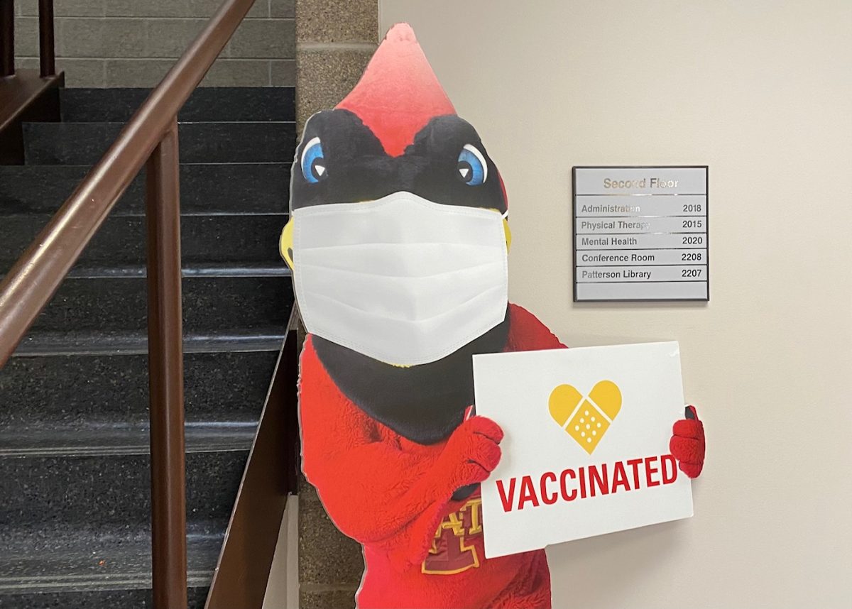 Cardboard cutout of Cy promotes vaccination at the Thielen Student Health Center on Oct. 3, 2024.