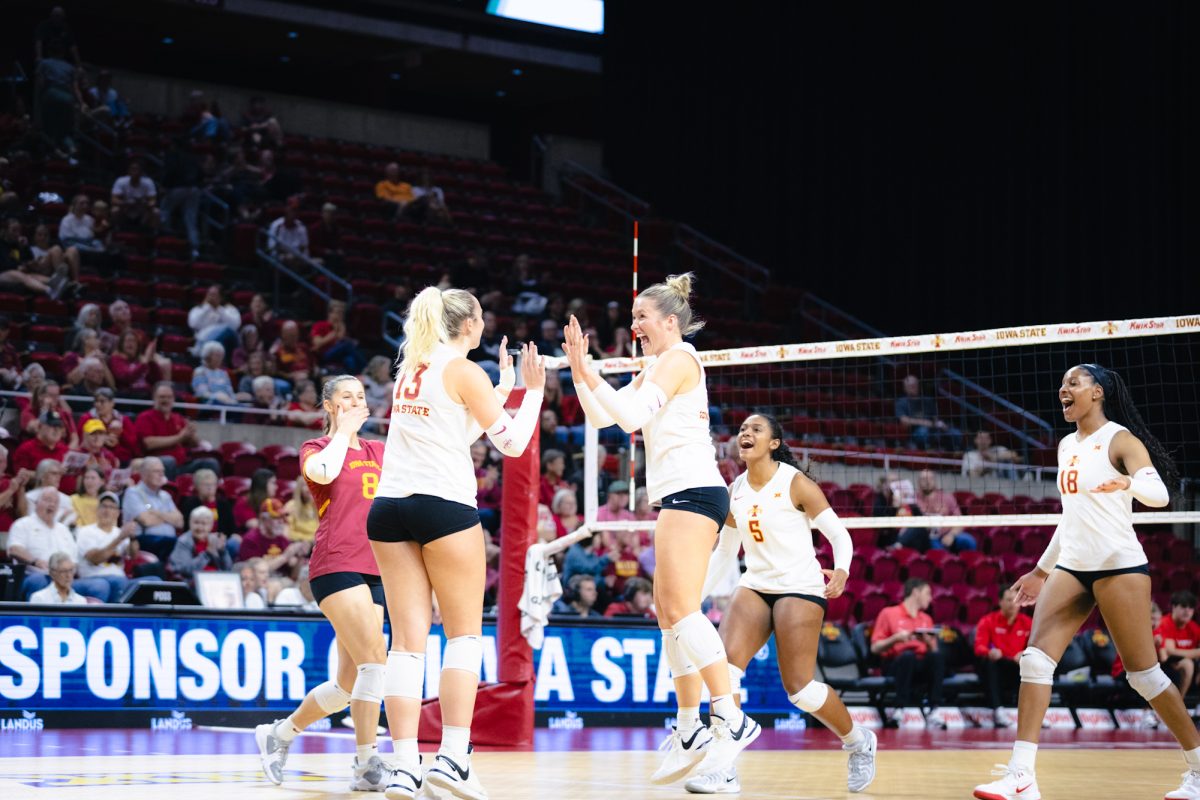 The Iowa state volleyball team celebrate during the Iowa State vs Cincinnati volleyball game at Hilton Coliseum on Oct. 2, 2024.