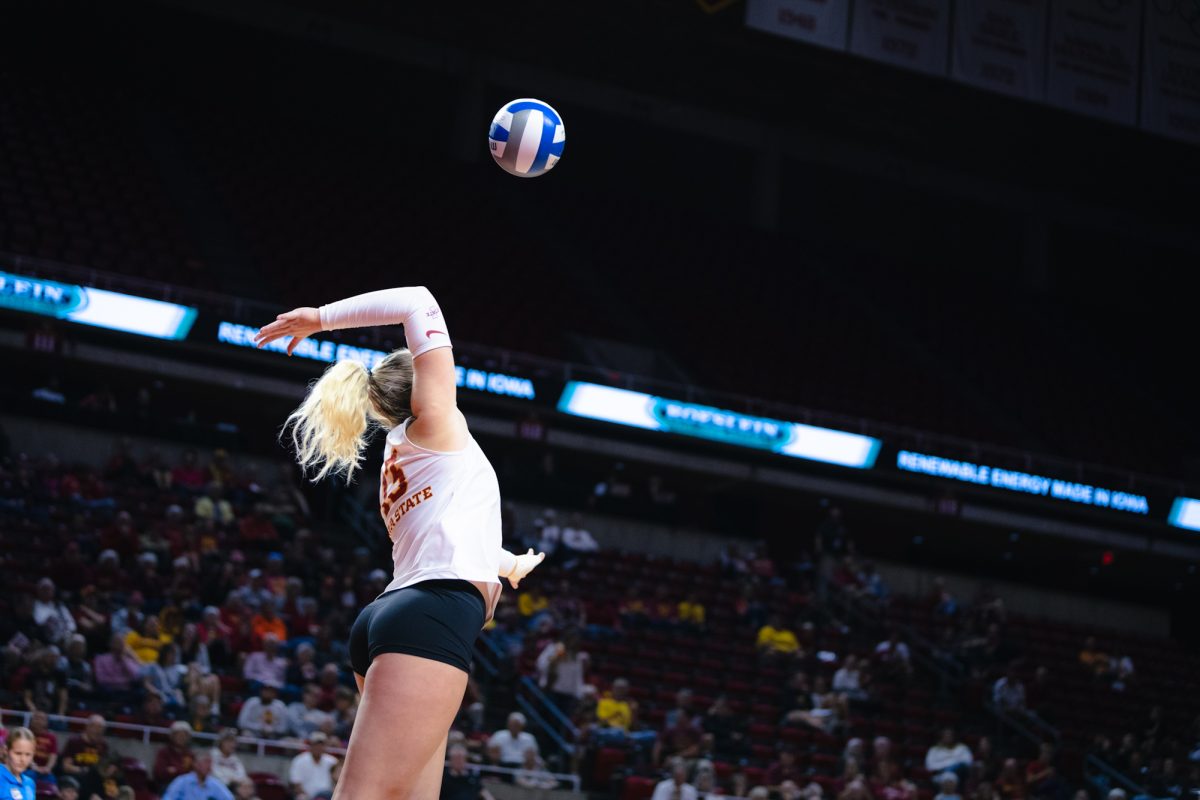 Lilly Wachholz (13) serves ball during the Iowa State vs Cincinnati volleyball game at Hilton Coliseum on Oct. 2, 2024.