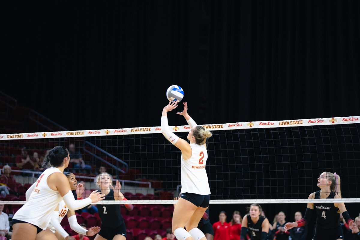 Morgan Brandt (2) sets the ball during the Iowa State vs Cincinnati volleyball game at Hilton Coliseum on Oct. 2, 2024.