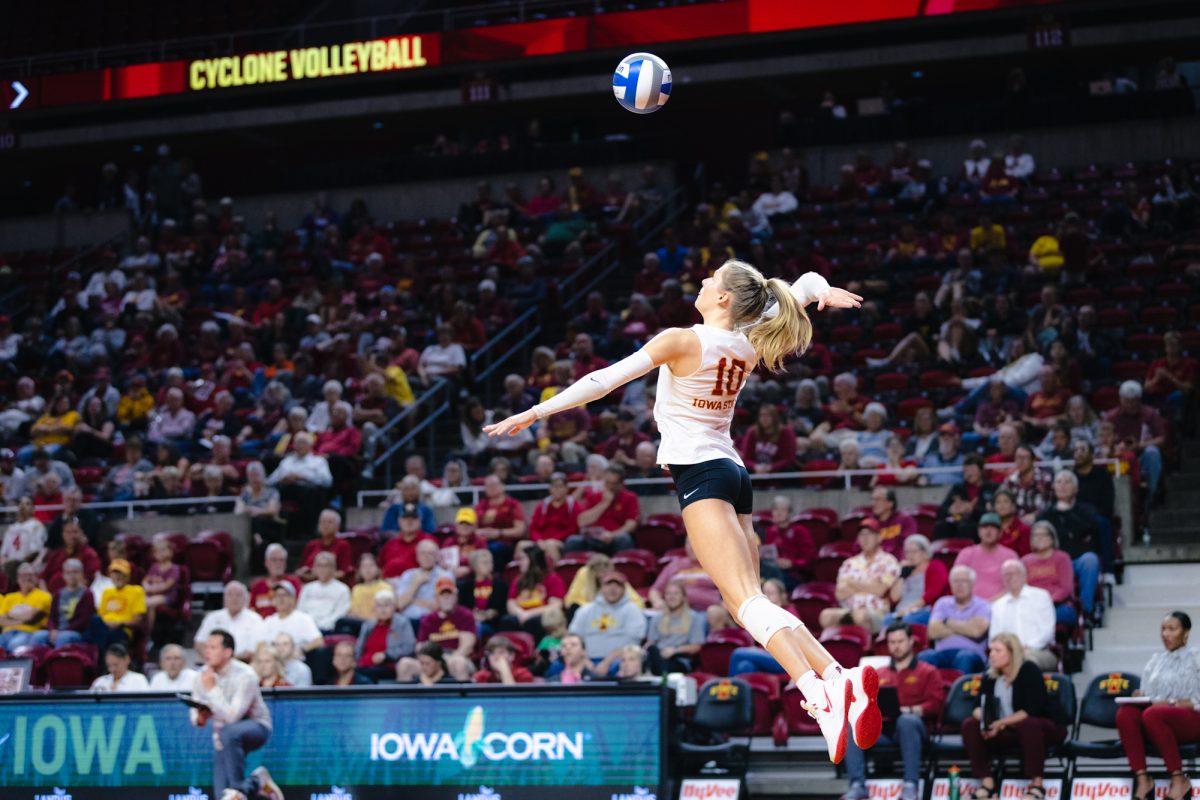 Rachel Van Gorp serves the ball during the Iowa State vs Cincinnati volleyball game at Hilton Coliseum on Oct. 2, 2024.