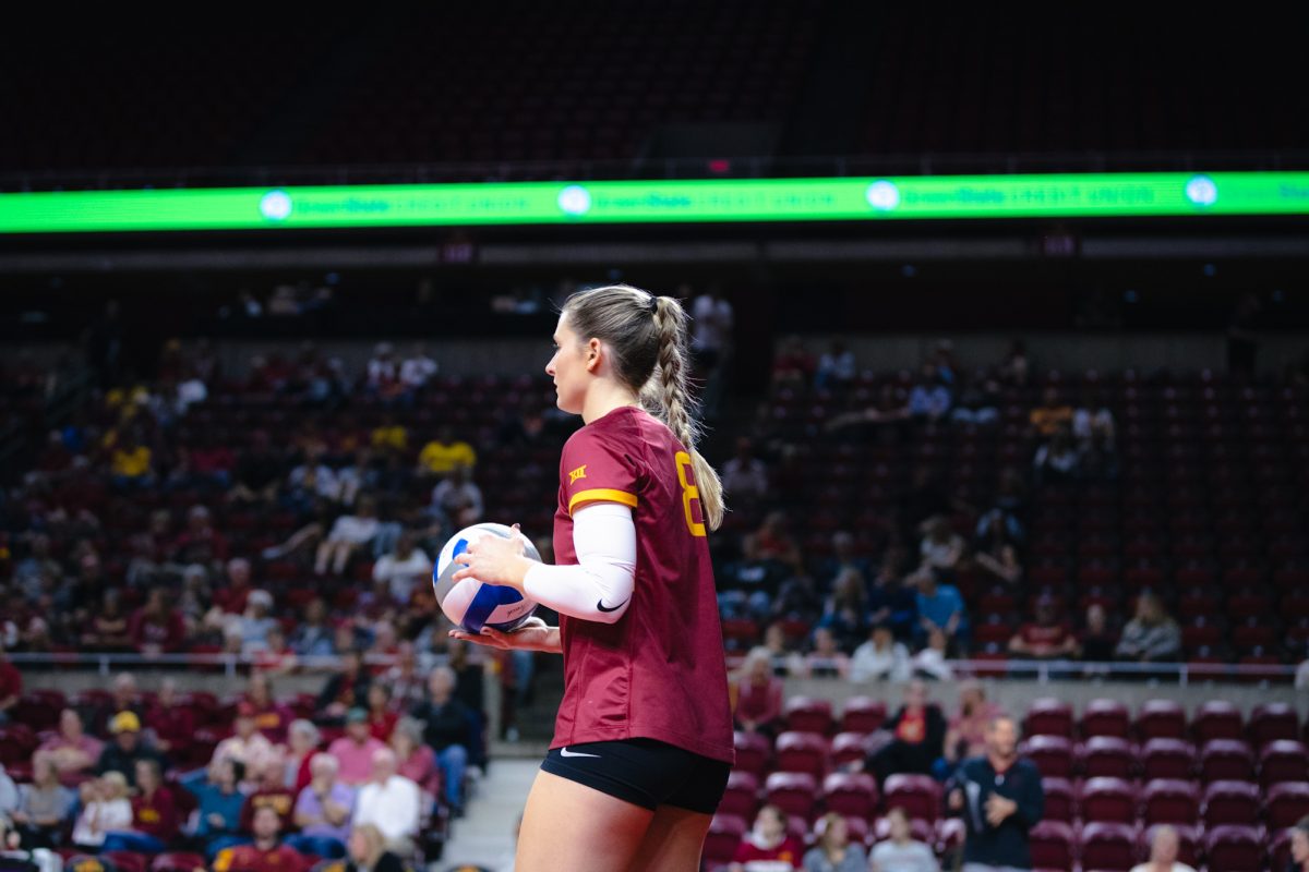 Brooke Stonestreet (8) goes up to serve during the Iowa State vs Cincinnati volleyball game at Hilton Coliseum on Oct. 2, 2024.