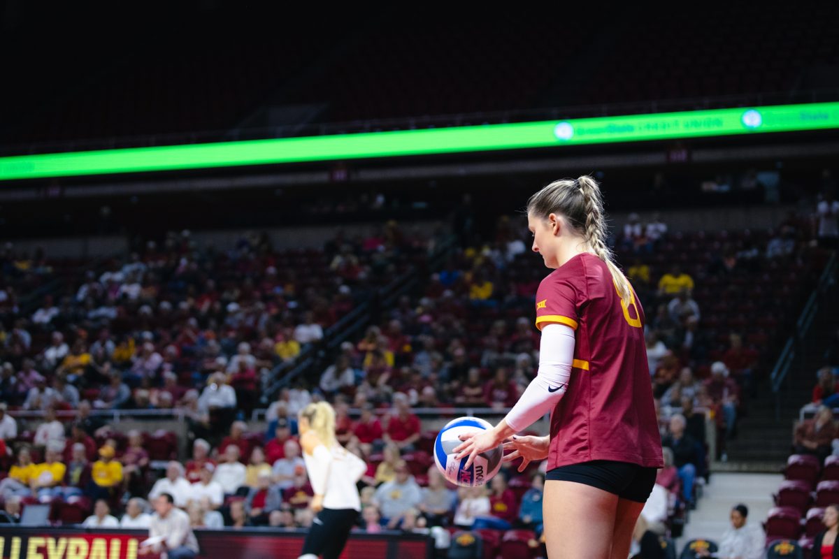 Brooke Stonestreet (8) goes up to serve during the Iowa State vs Cincinnati volleyball game at Hilton Coliseum on Oct. 2, 2024.