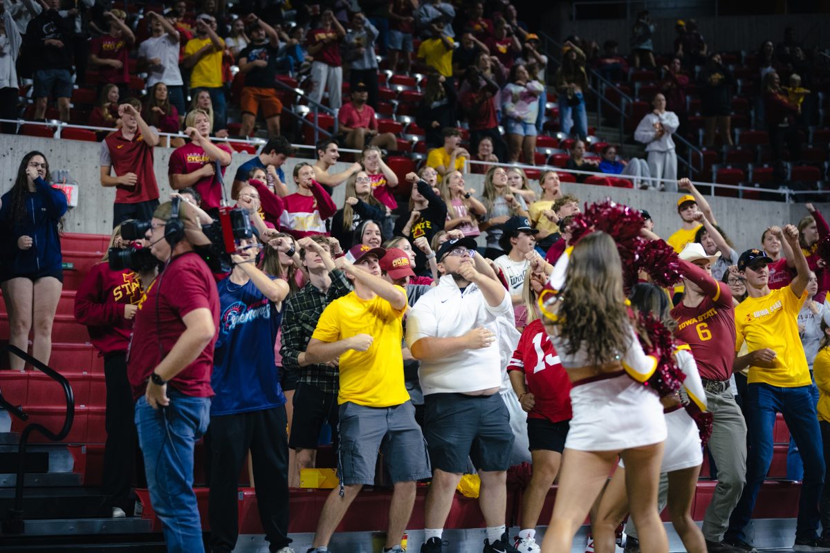 Iowa State students dancing during the Iowa State vs Cincinnati volleyball game at Hilton Coliseum on Oct. 2, 2024.