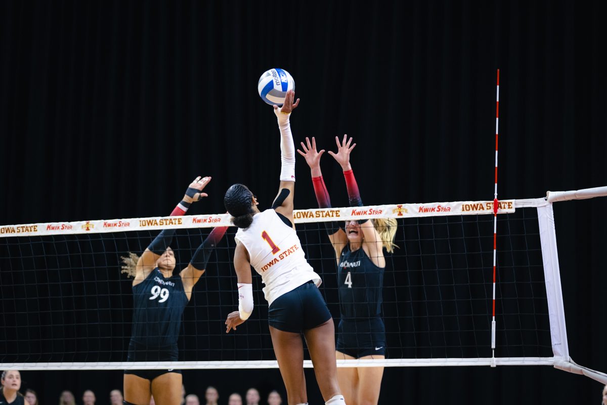 Pam McCune goes up to hit the ball during the Iowa State vs Cincinnati volleyball game at Hilton Coliseum on Oct. 2, 2024.