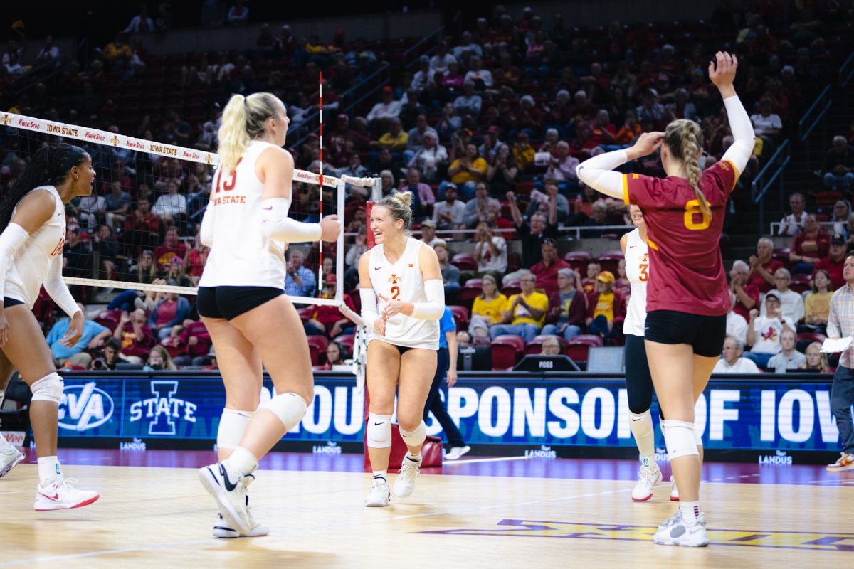 Morgan Brandt (2) and her team celebrates during the Iowa State vs Cincinnati volleyball game at Hilton Coliseum on Oct. 2, 2024.