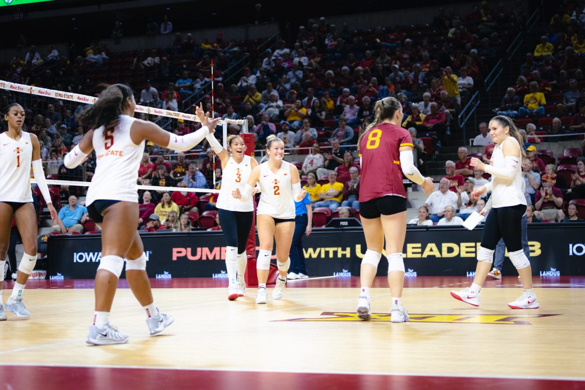 The Iowa State volleyball team celebrate during the Iowa State vs Cincinnati volleyball game at Hilton Coliseum on Oct. 2, 2024.