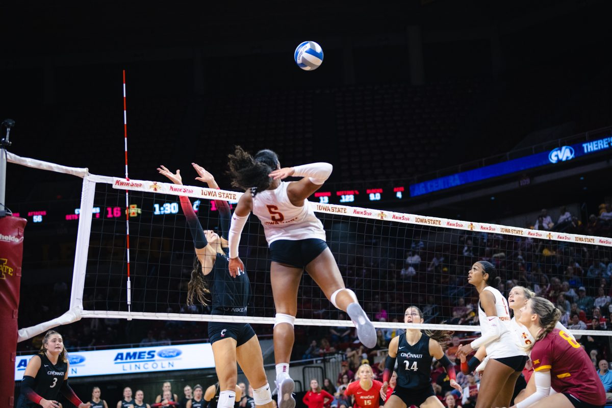 Maya Duckworth (5) goes up to hit during the Iowa State vs Cincinnati volleyball game at Hilton Coliseum on Oct. 2, 2024.