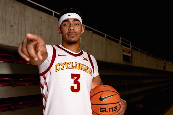 Iowa State Mens Basketball guard Tamin Lipsey (3) poses with a ball for the 2024 media day in Hilton Coliseum, Oct. 9, 2024.