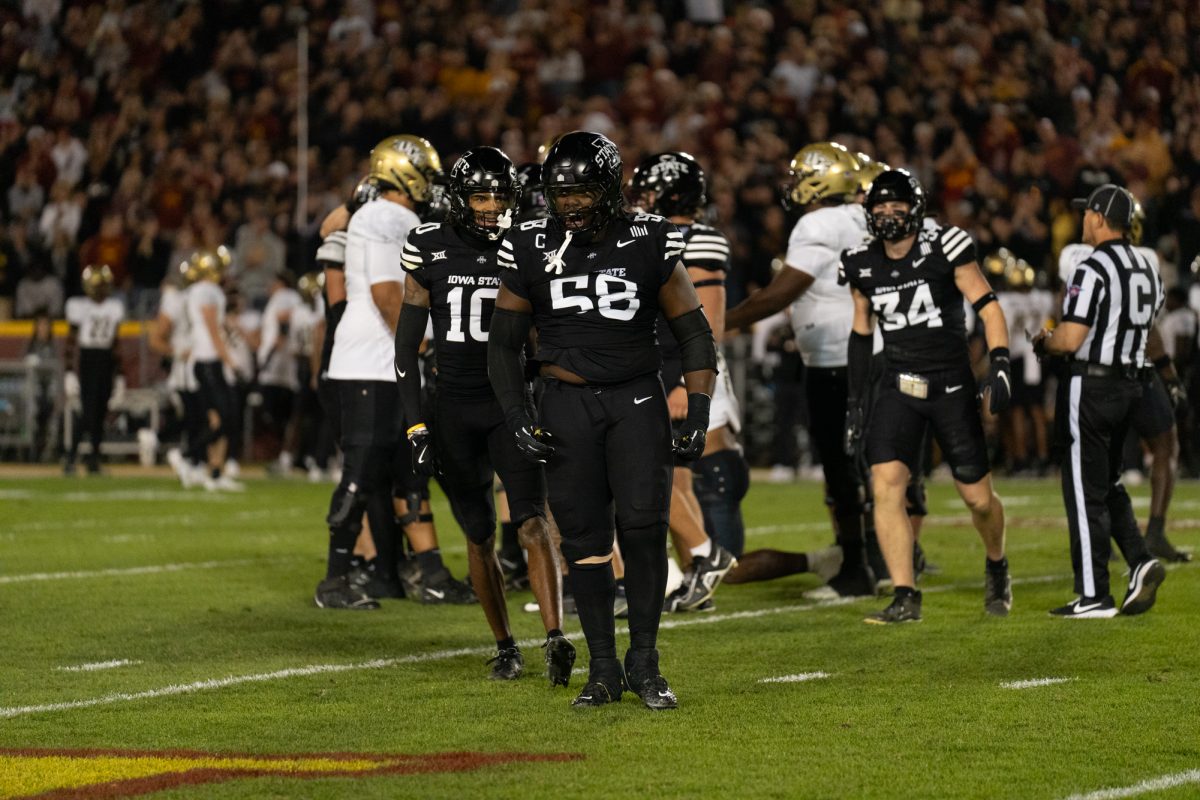 J.R. SIngleton (58) and Darien Porter (10) celebrate preventing a UCF fourth down conversion during the game vs. University of Central Florida, Jack Trice Stadium, Ames, Iowa, Oct. 19, 2024.