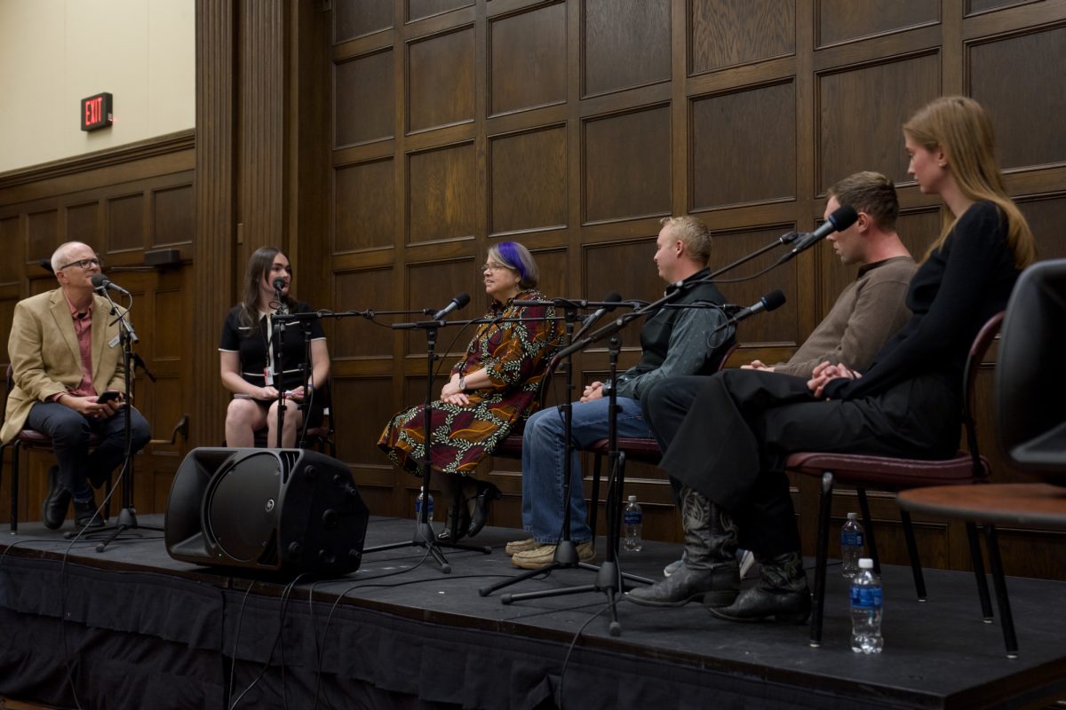 From left to right, Ben Kieffer, Cleo Westin, Karen Kedrowski, Trey Wellman, Cole Lendaman, and Katie Babb sit on a panel for Iowa Public Radio's River to River in the Memoral Union, Oct. 17, 2024.