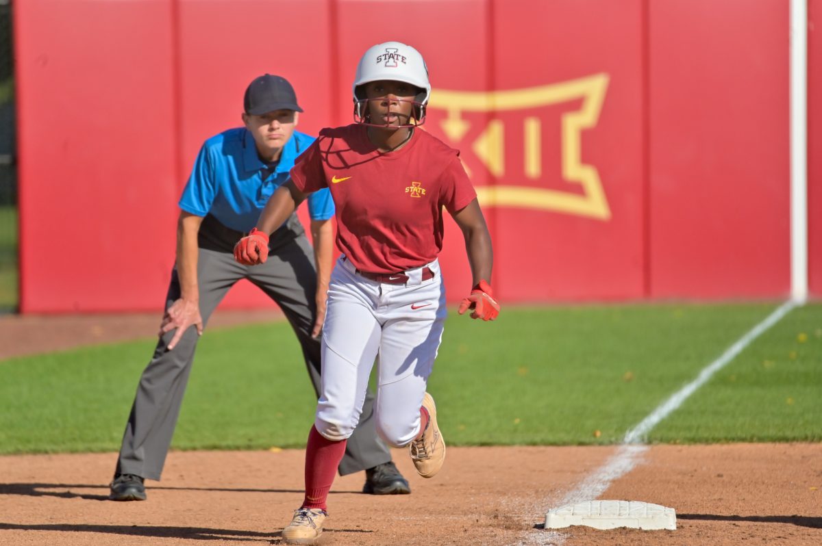 Iowa State Softball player Sereniti Trice (1) rounds third and looks towards home to score against Kirkwood during a home game at the Cyclone Sports Complex, Oct. 2, 2024.