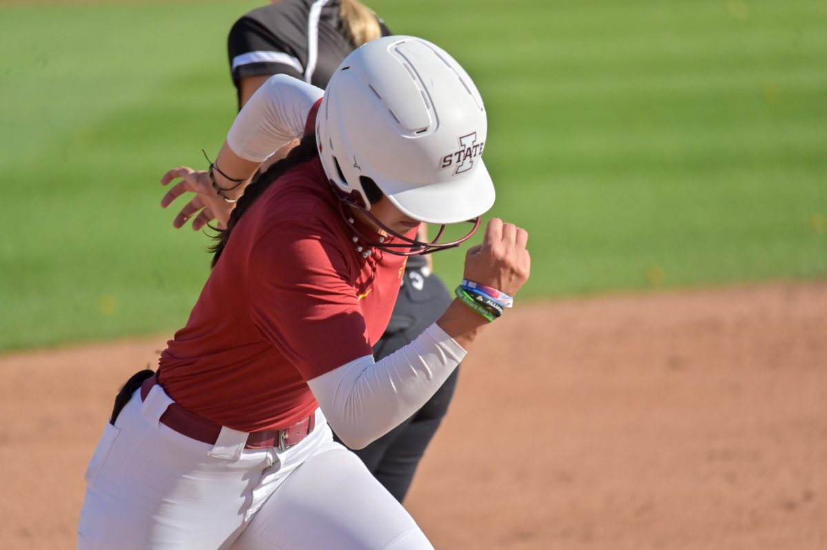 Iowa State Softball player Hayleigh Oliver (12) takes off third base headed home to score against Kirkwood during a home game at the Cyclone Sports Complex, Oct. 2, 2024.