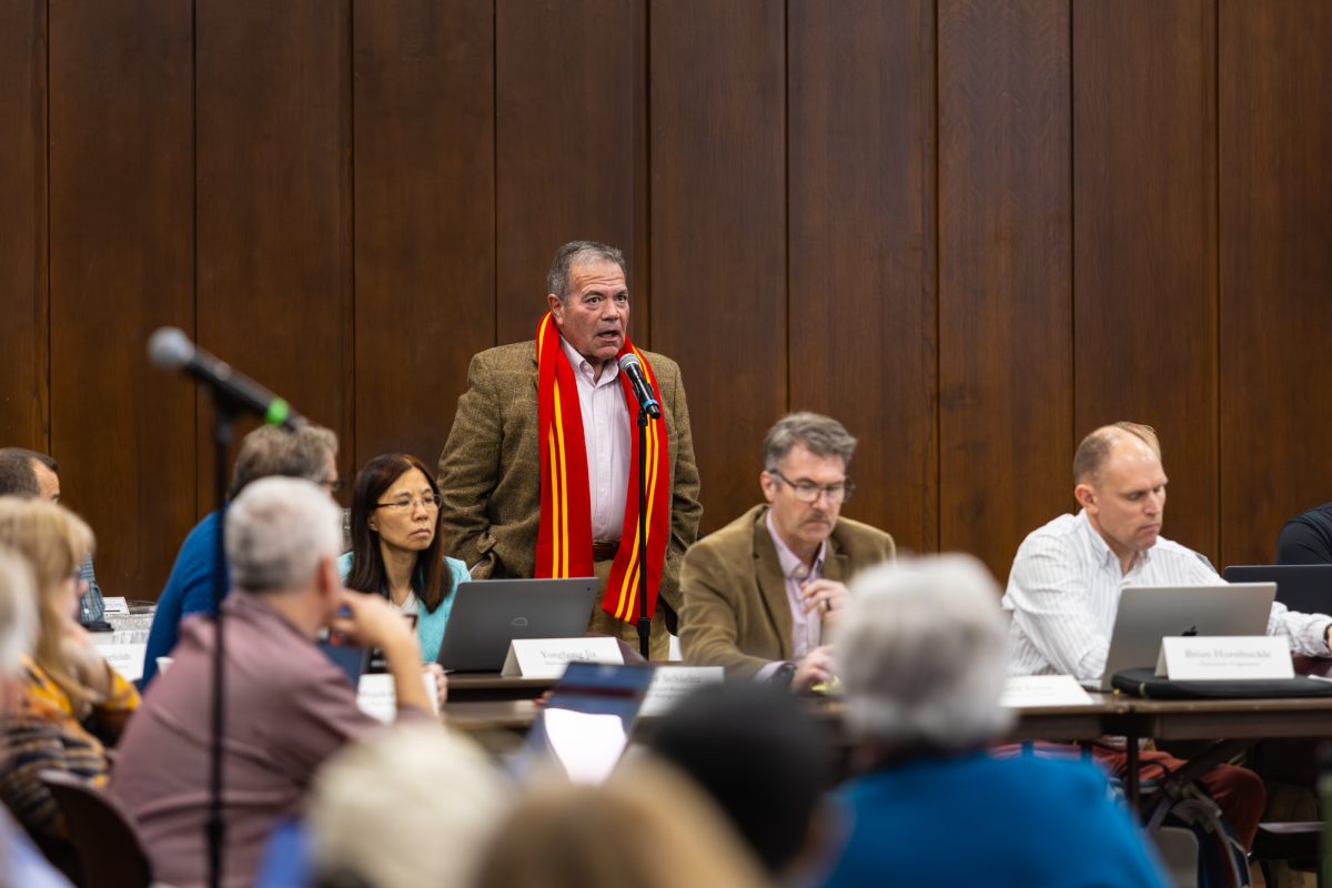 Info Systems & Business Analytics represent Tony Townsend speaks during the Faculty Senate meeting at the Memorial Union, Nov. 12, 2024.