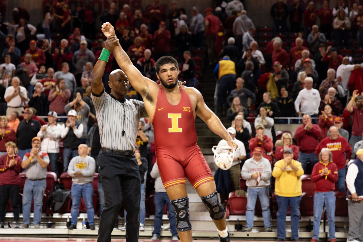 Daniel Herrera wins his match at the Iowa State vs. Navy wrestling meet, Hilton Coliseum, Ames, Iowa, Nov. 15, 2024.