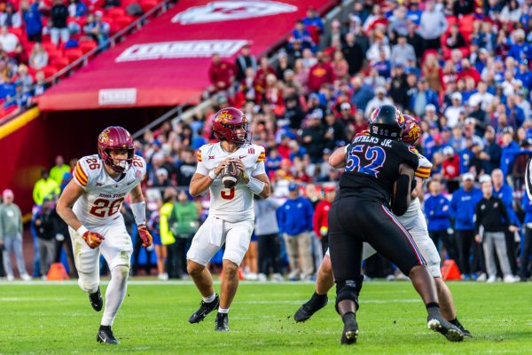 Rocco Becht (3) gets ready to throw the ball during the Iowa State vs. University of Kansas football game at Arrowhead Stadium in Kansas City, MO on Nov. 9, 2024.