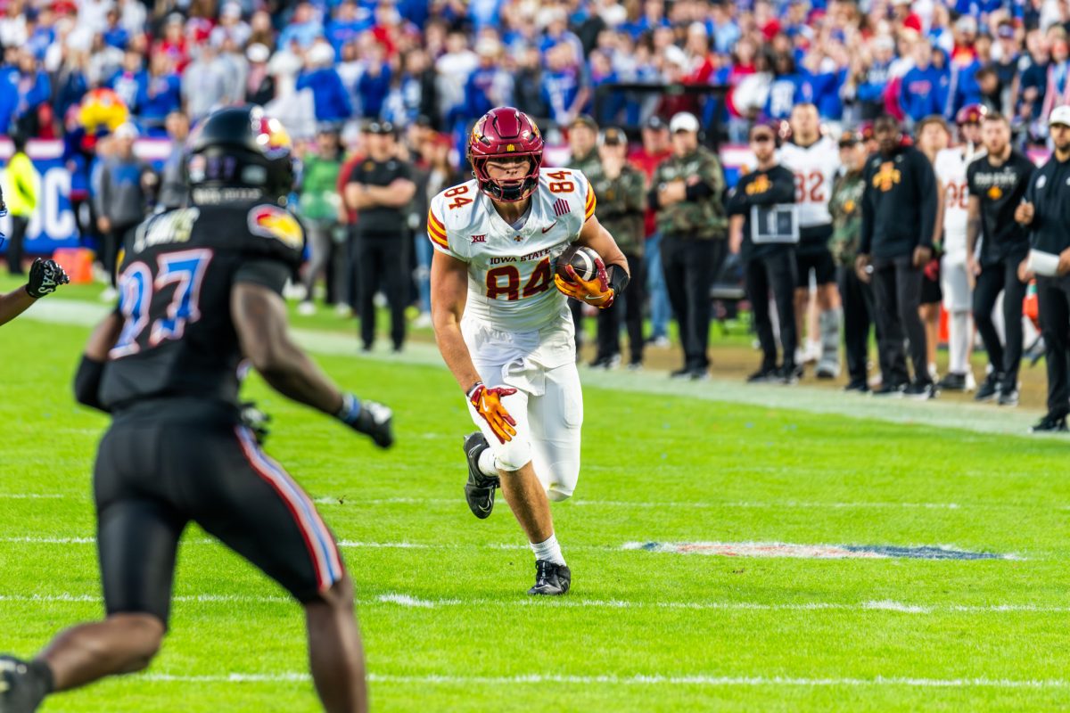 Gabe Burkle (84) runs with the ball during the Iowa State vs. University of Kansas football game at Arrowhead Stadium in Kansas City, MO on Nov. 9, 2024.