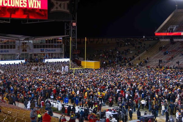 Fans rush the field after Iowa State beats Kansas State University 29-21 at Jack Trice Stadium on Nov. 30, 2024 in Ames, Iowa.