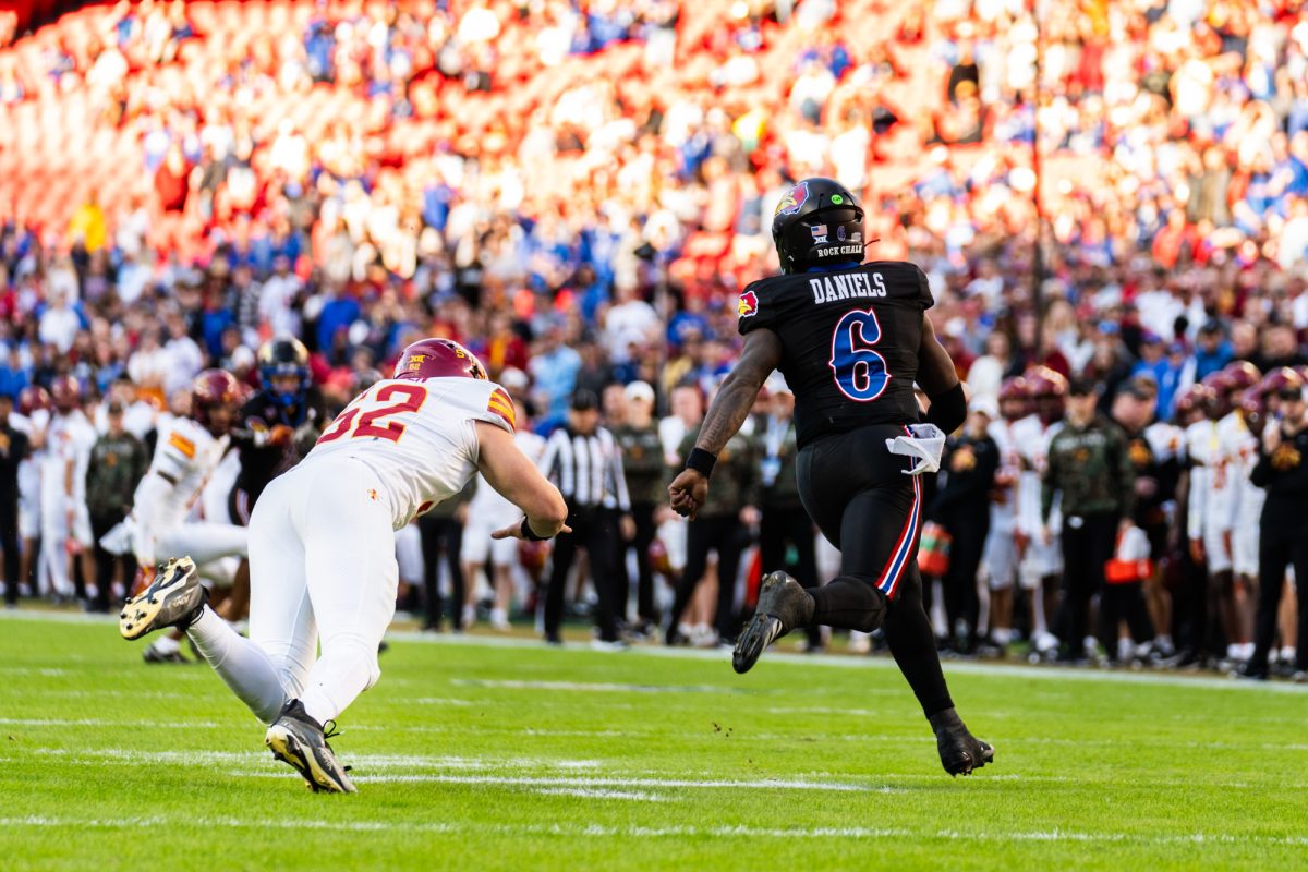 Joey Peterson (52) misses a tackle during the Iowa State vs. University of Kansas football game at Arrowhead Stadium in Kansas City, MO on Nov. 9, 2024.