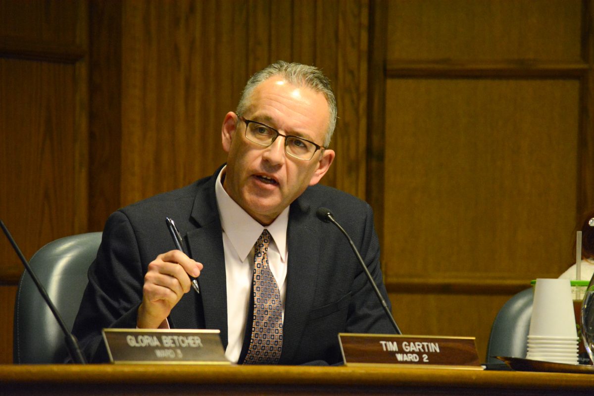 Council Member Tim Gartin asks a question about the construction of a new furniture store in Ames, Ames City Hall, Ames, Iowa, Nov. 12, 2024.