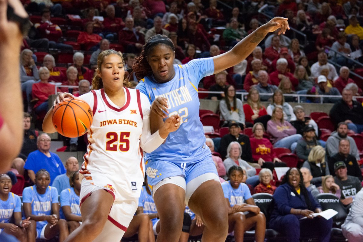 Sydney Harris (25) moves the ball down the court while being guarded by Xyllize Harrison (32) during the game vs. Southern University, Hilton Coliseum, Ames, Iowa, Nov. 10, 2024.