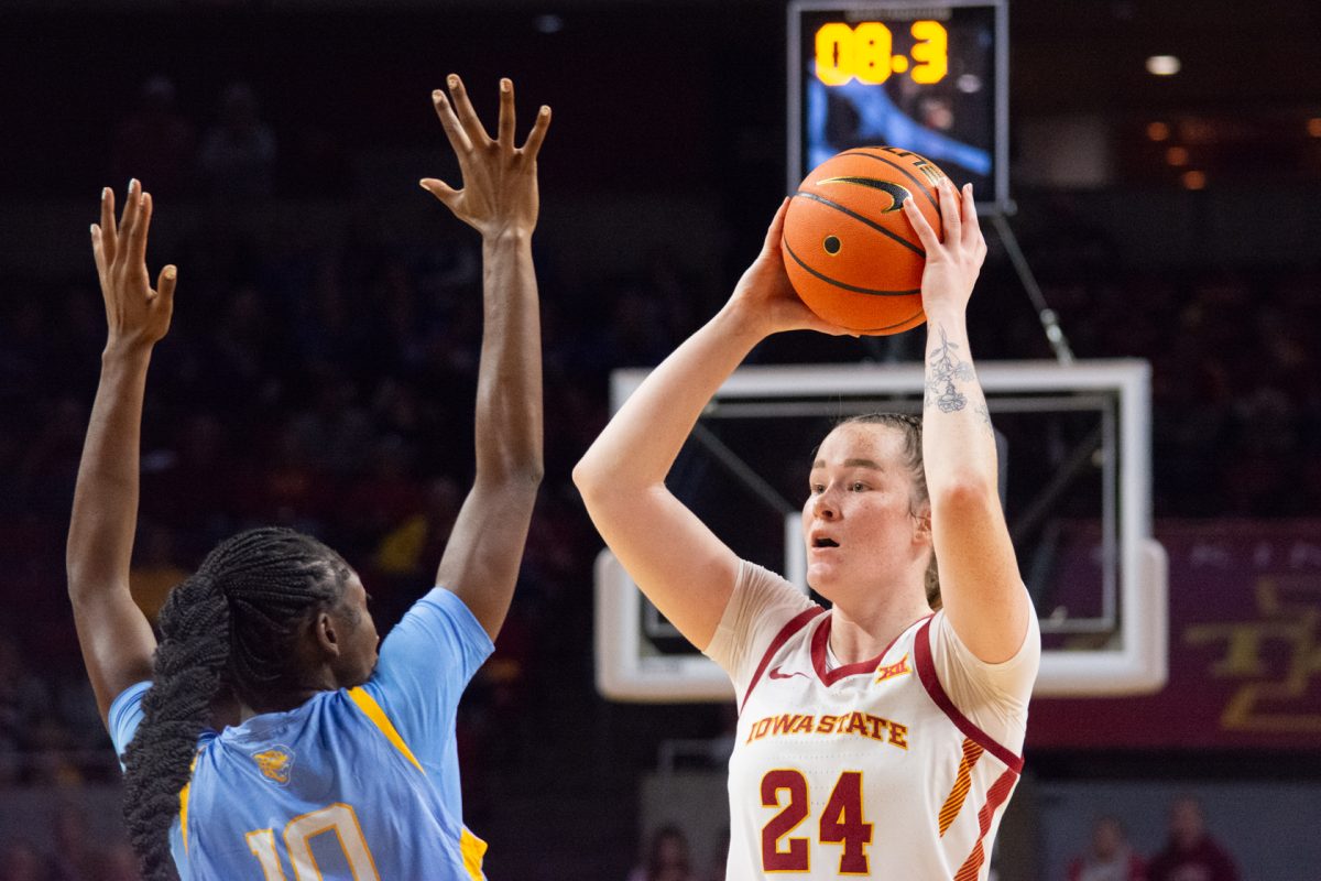 Addy Brown (24) looks to pass the ball while being guarded by Jocelyn Tate (10) during the game vs. Southern University, Hilton Coliseum, Ames, Iowa, Nov. 10, 2024.