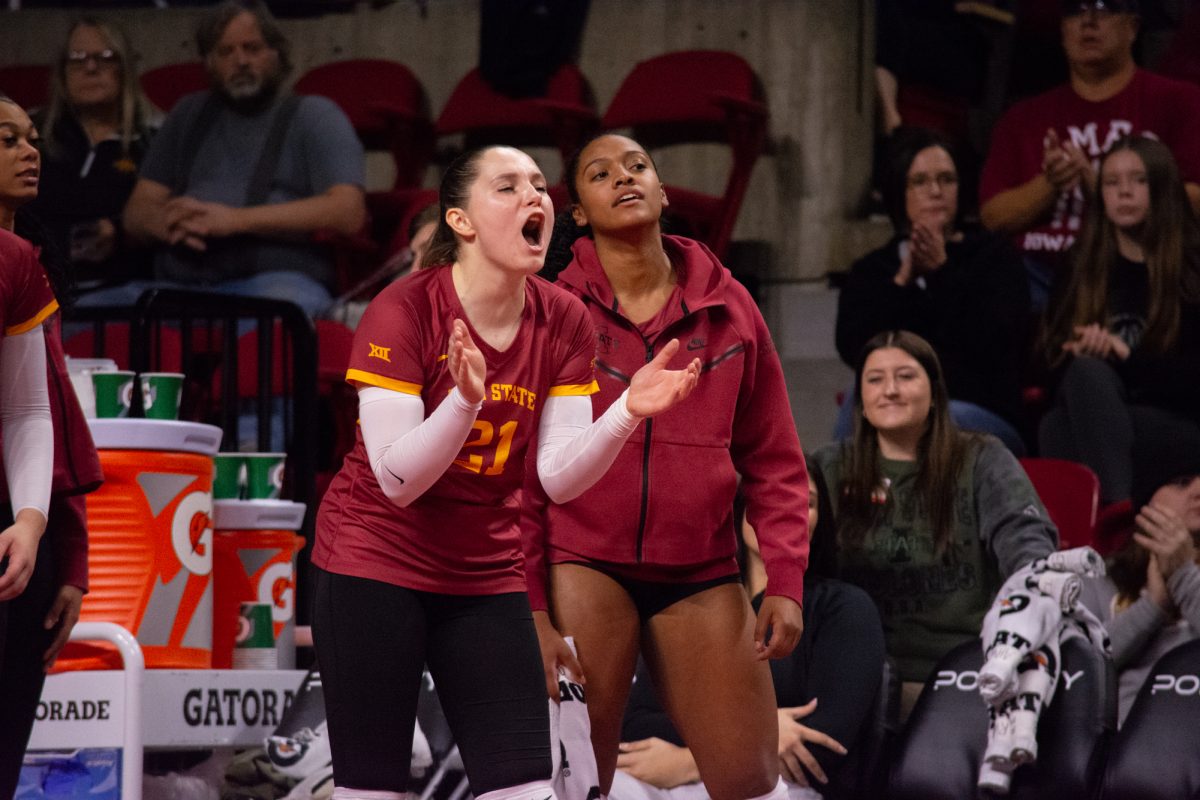 Paula Krzeslak (21) cheers on her  teammates from the sideline during the game vs. University of Colorado, Hilton Coliseum, Ames, Iowa, Nov. 13, 2024.