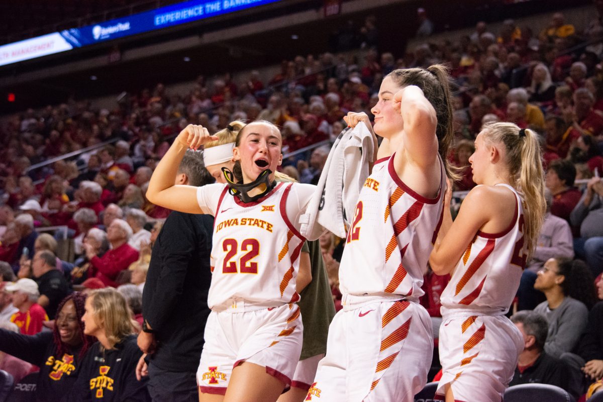 Reagan Wilson (22) and Kenzie Hare (12) celebrate scoring from the sideline during the game vs. Southern University, Hilton Coliseum, Ames, Iowa, Nov. 10, 2024.