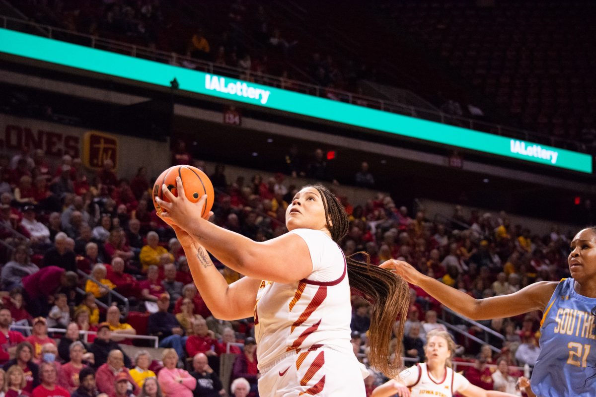 Audi Crooks (55) catches a rebound and looks to the hoop to score during the game vs. Southern University, Hilton Coliseum, Ames, Iowa, Nov. 10, 2024.