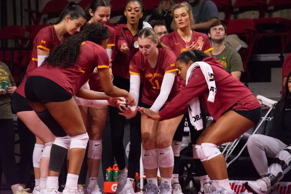 The team celebrates Iowa State scoring a point from the sideline during the game vs. University of Colorado, Hilton Coliseum, Ames, Iowa, Nov. 13, 2024.