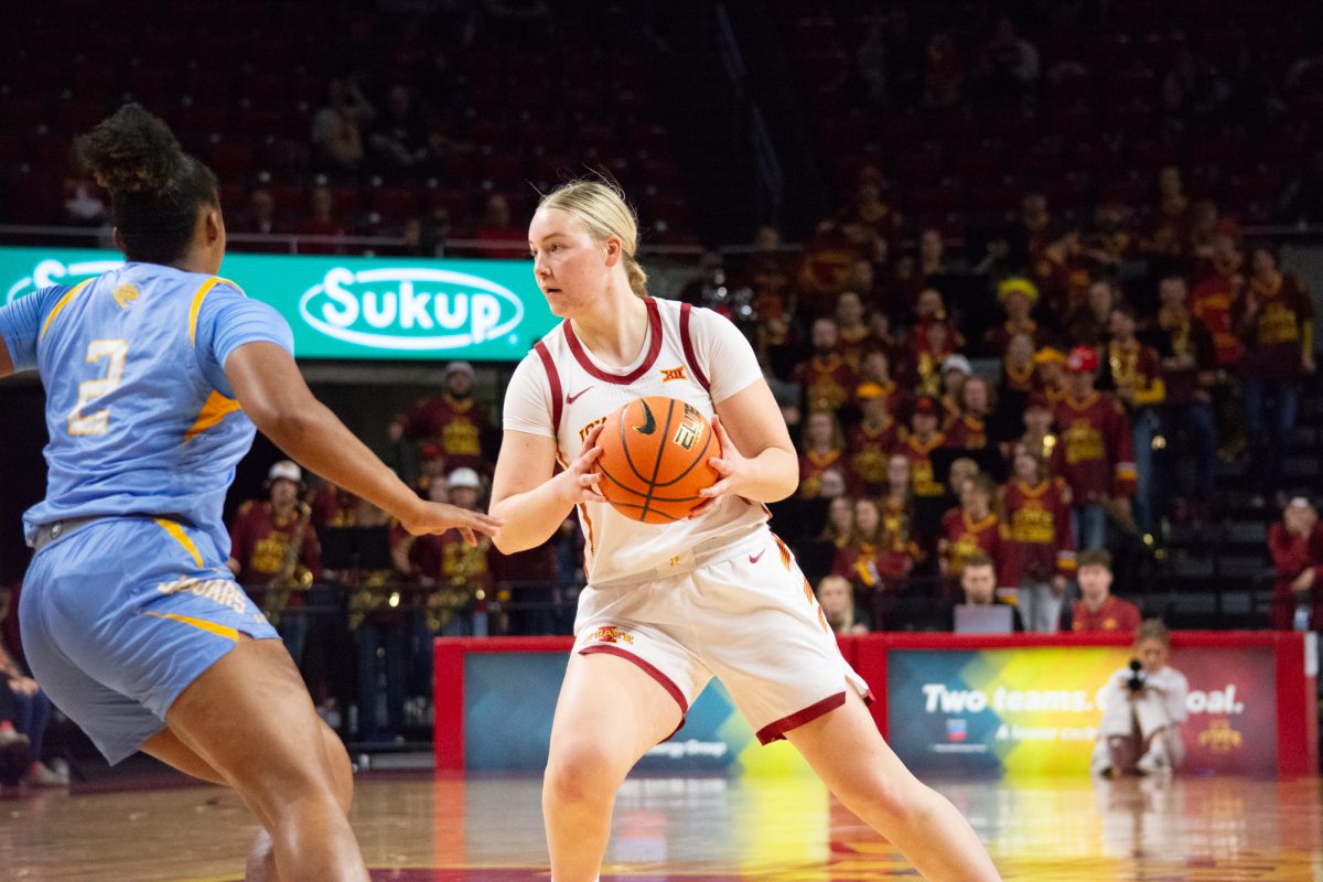 Aili Tanke (32) looks to pass the ball while being guarded by Aleighyah Fontenot (2) during the game vs. Southern University, Hilton Coliseum, Ames, Iowa, Nov. 10, 2024.