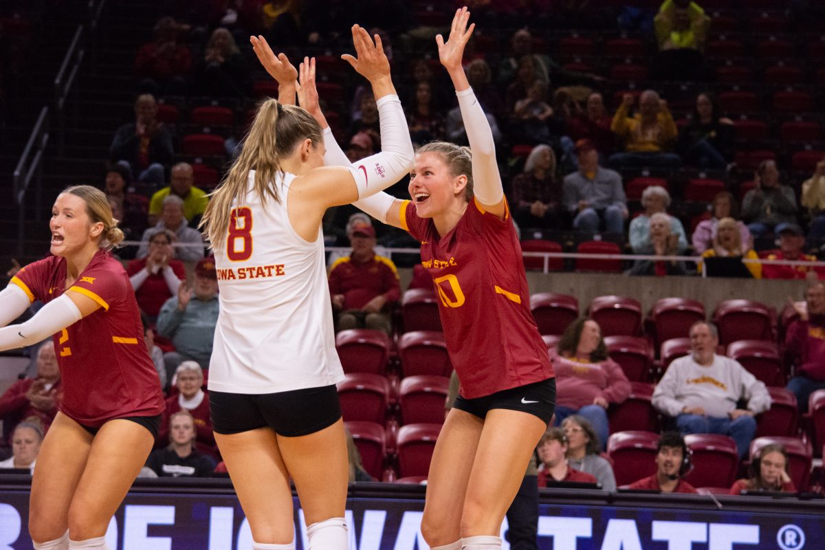 Brooke Stonestreet (8) and Rachel Van Gorp (10) celebrate scoring during the game vs. University of Colorado, Hilton Coliseum, Ames, Iowa, Nov. 13, 2024.