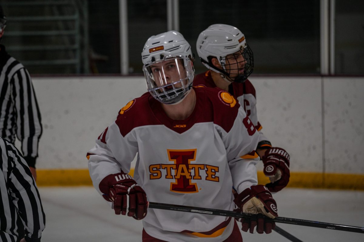 Iowa State men's hockey club player Nathan Monroe (81) glances towards the camera at a home game against Midland University in the Ames Ice Arena, Nov. 1, 2024.