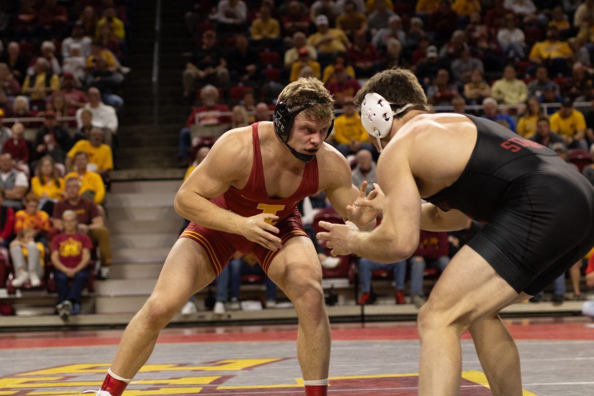 Evan Bockman looking to attack opponent during the Iowa State vs. Stanford University wrestling match at Hilton Coliseum, Ames, Iowa, Nov. 8, 2024.