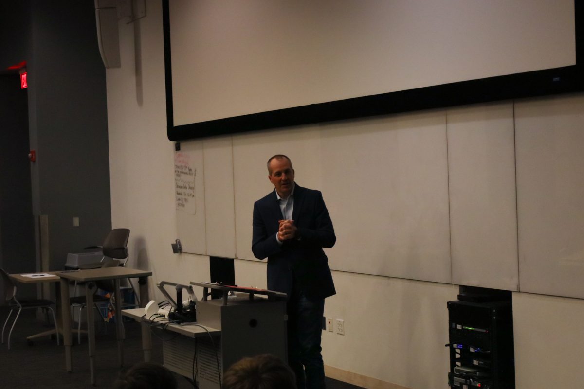 Mike Naig talking to those in the front row during the Lessons in Leadership Lecture, taken on November 11, 2024 in Ames, IA