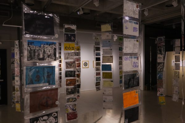 A look at the postcards inside gallery 181, taken at the College of Design, Ames, IA, on November 8, 2024