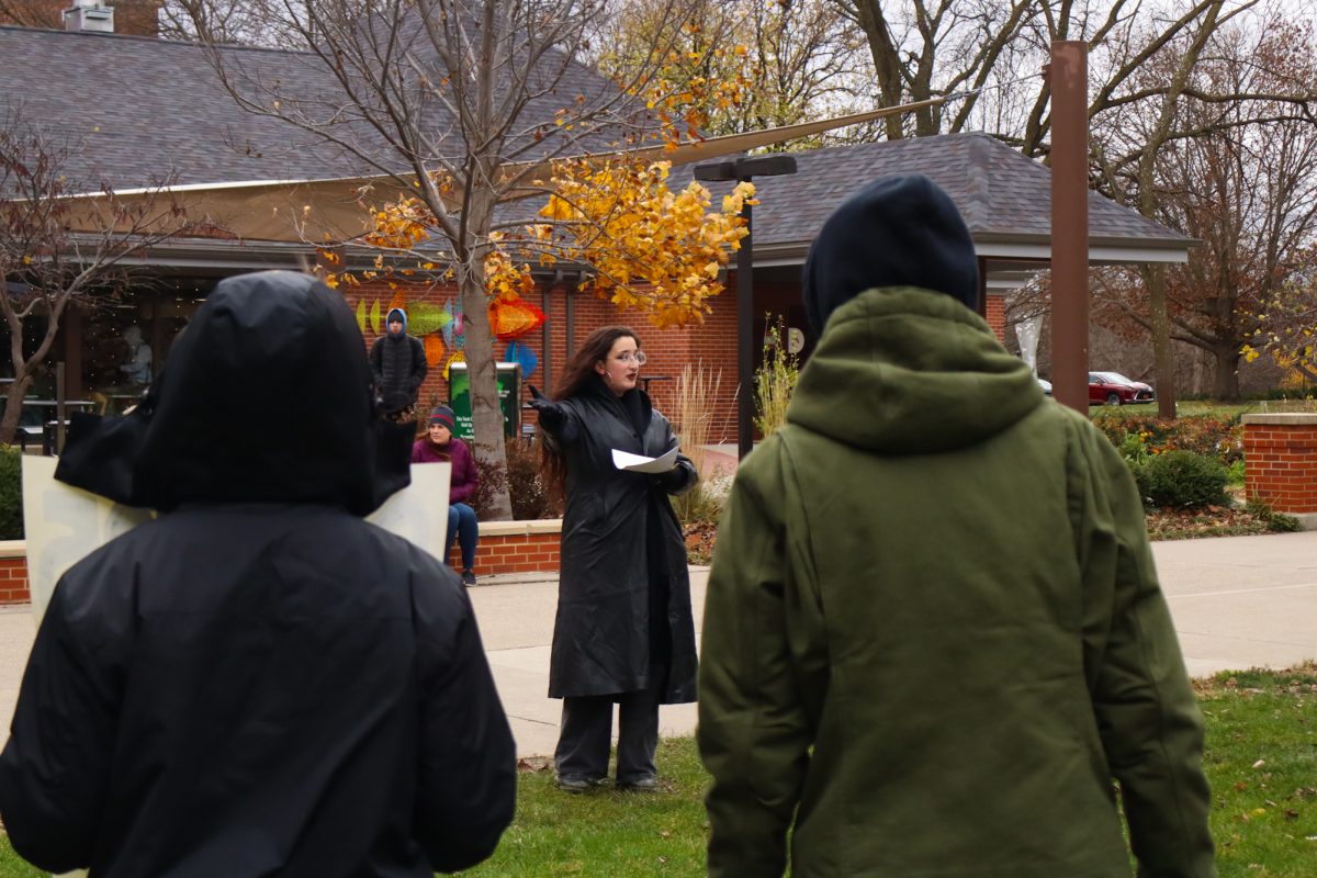 Graciela Rangel speaks to their fellow protesters expressing the importance of DEI, taken on November 11, 2024 outside Park Library, Ames, IA